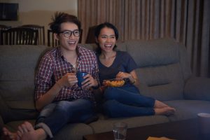 couple watching comedy movies