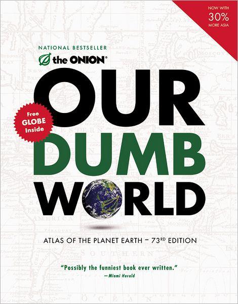 The Onion's "Our Dumb World" book cover. The words "Our Dumb World" fill the whole cover in bold and an image of the Earth takes the place of the "O" in world