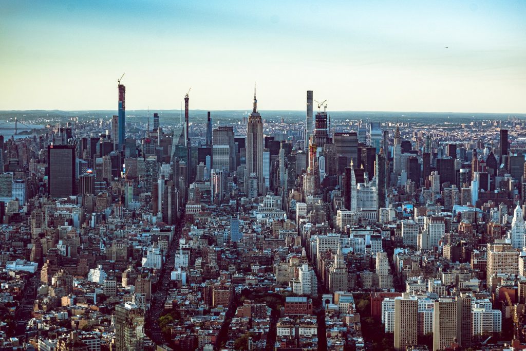 New York City skyline set against an afternoon sky