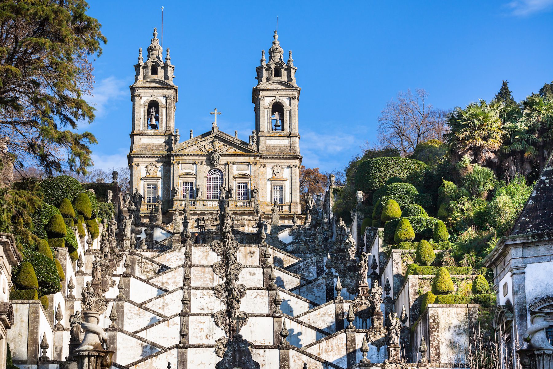 A castle style historic building with countless statues and stairways make up Braga in Portugal