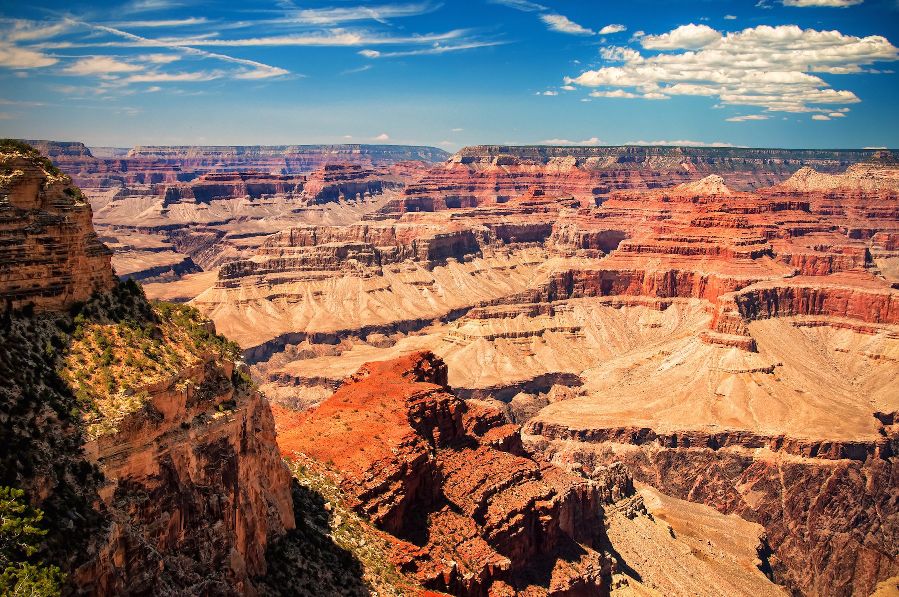 Deep peaks of valleys consisting of red rock constitute the Grand Canyon National Park, Arizona
