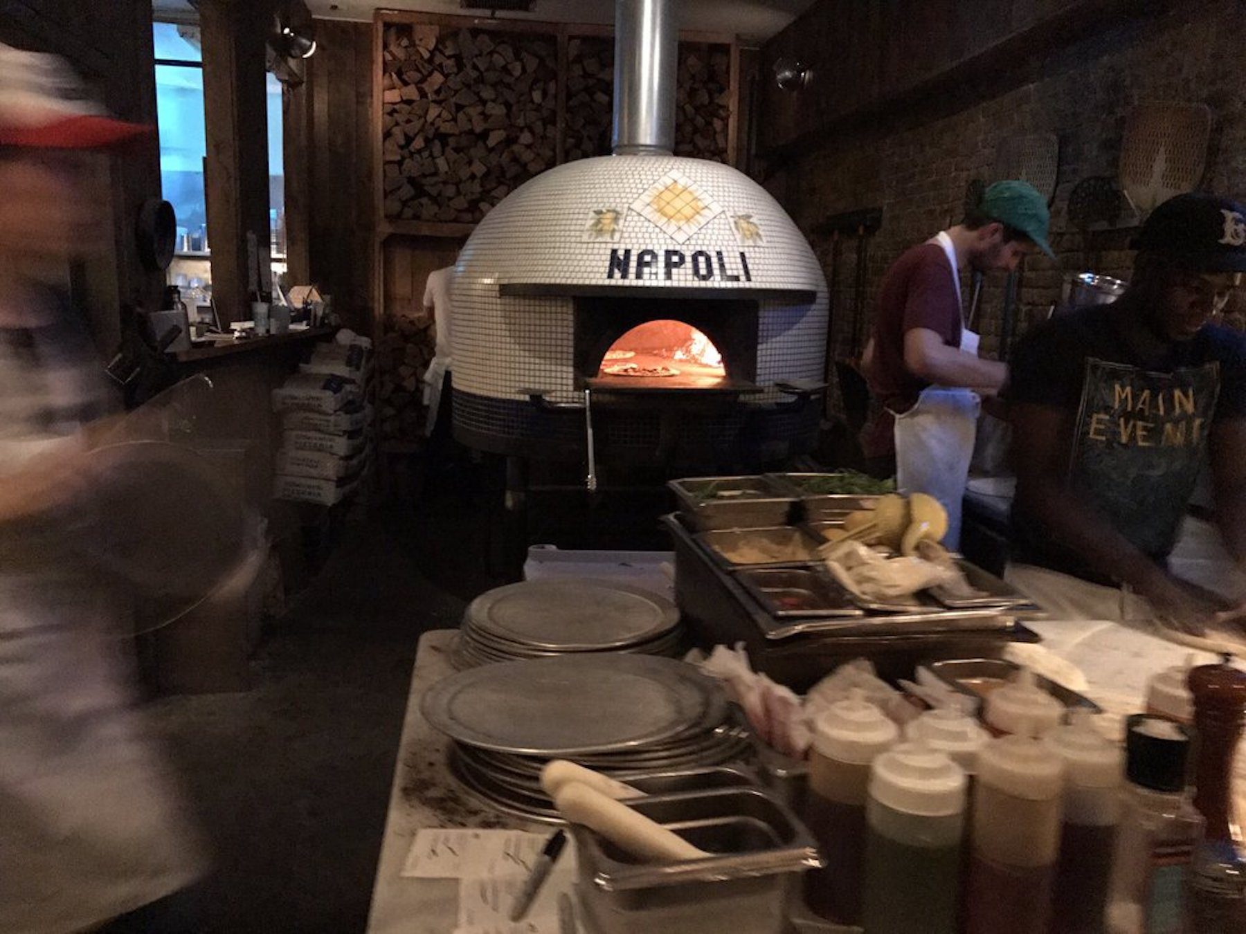 Wood-fired pizza oven in Paul Gee's Slice Shop, New York. 