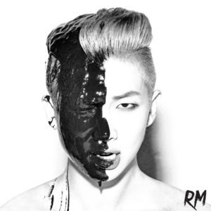 Album cover for RM, black and white image of the singer with thick black paint dripping down one side of his face.