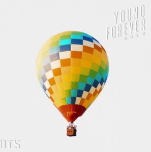 Album cover for The Most Beautiful Moment in Life: Young Forever, colorful hot air balloon over grayish-white background.