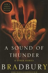 A Sound of Thunder and Other Stories by Ray Bradbury, cover featuring a hand holding a butterfly or moth.
