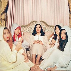 Cover art for Red Velvet's The Velvet EP featuring the band in loungewear.