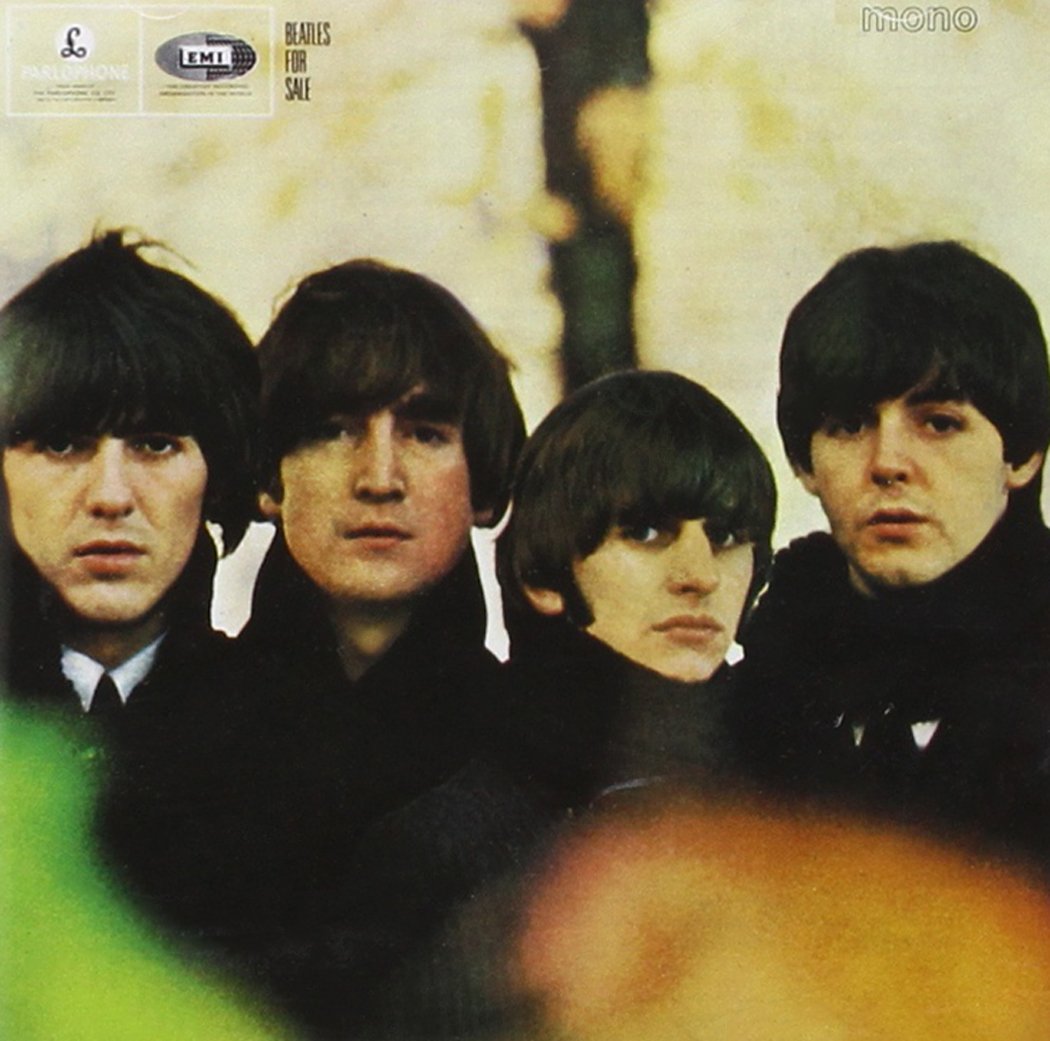 "Beatles for Sale" by The Beatles. Members of the band standing shoulder-to-shoulder off in the distance 