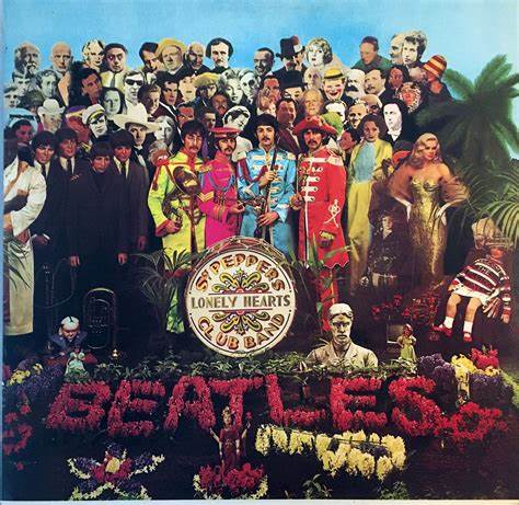 "Sgt. Pepper's Lonely Hearts Club Band" by The Beatles. Various period celebrities are imposed onto the cover with members of the band mixed in. The name of the band "The Beatles" is written in the landscaping with pink flowers 